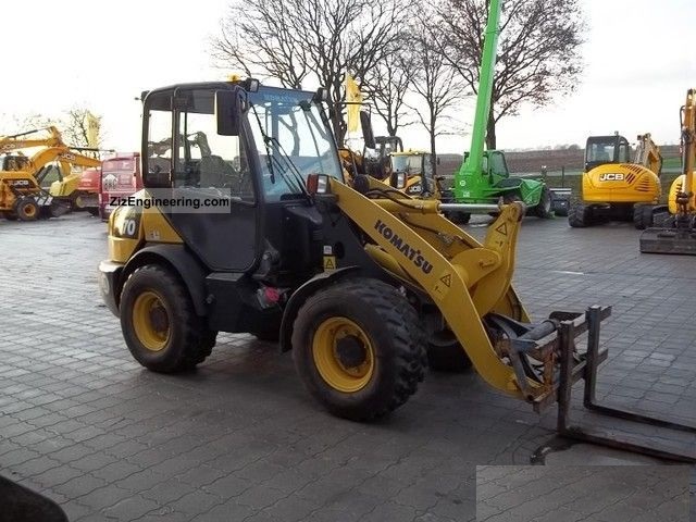 KOMATSU W 70 tłoki i pierścienie